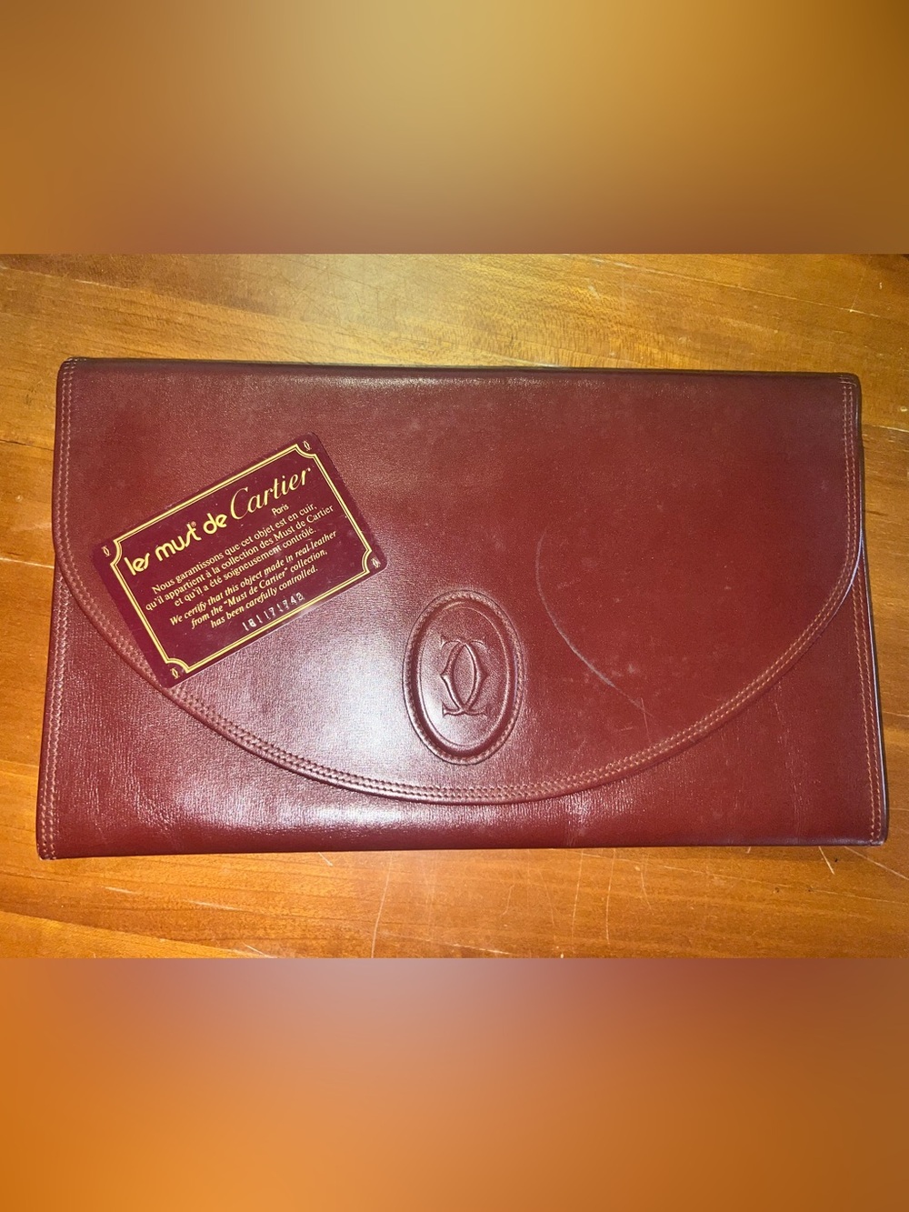 Vintage Cartier “Les Must de Cartier” Burgundy Leather Envelope Clutch